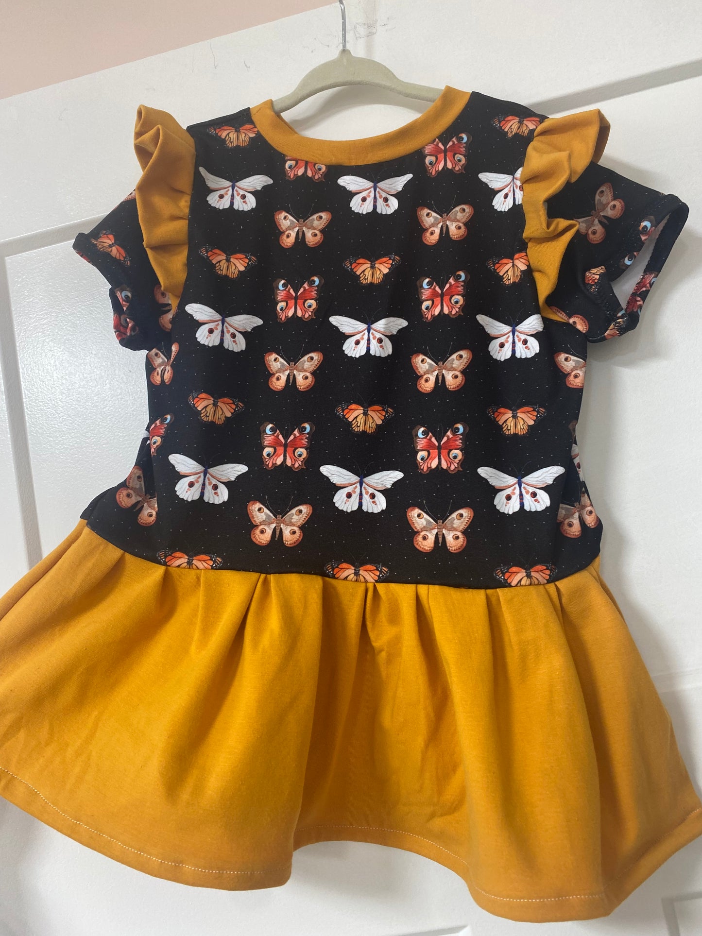 5T Butterfly Peplum Top